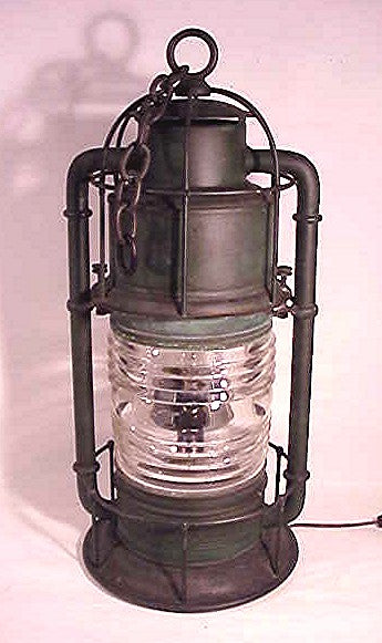 A great Brass lantern with maker's mark.