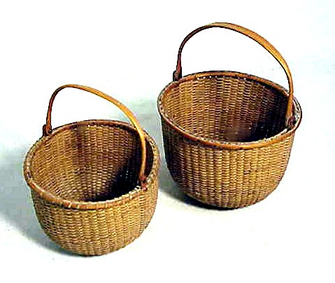 A pair of very rare antique miniature Nantucket Lightship Baskets