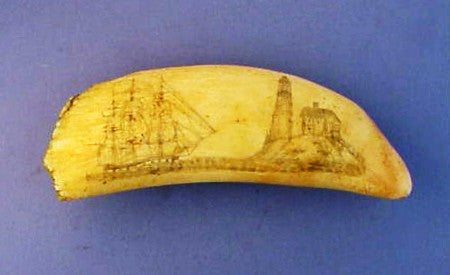 Antique American scrimshaw sperm whale's tooth lighthouse