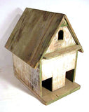 Antique folk made birdhouse