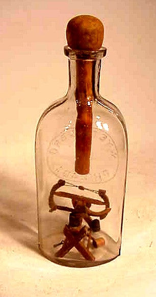 Antique tools in a bottle