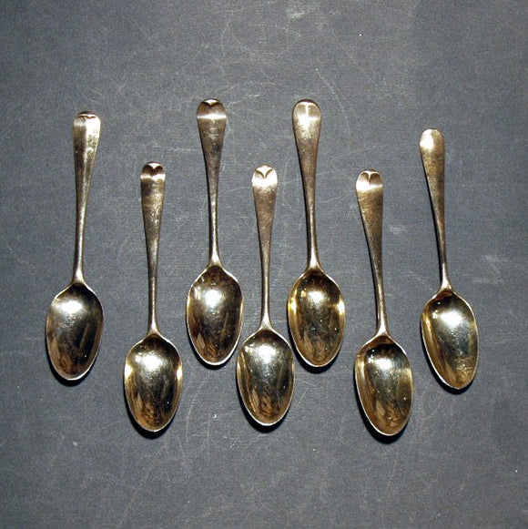 Assembled set of seven antique silver teaspoons