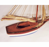 Charming vintage toy sailboat.