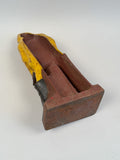 Antique Fisherman At The Tiller Doorstop