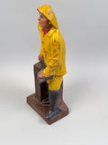 Antique Fisherman At The Tiller Doorstop