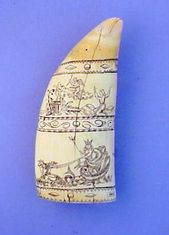 A Rare and Choice English Antique Scrimshaw Tooth.