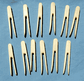 Rare set of 12 antique scrimshaw clothes pins