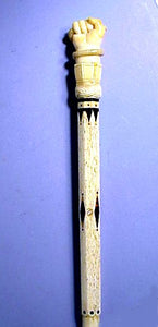 A great antique scrimshaw cane with carved fist and snake