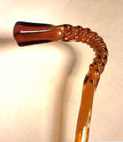 Antique amber color glass whimsey cane