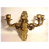 Antique brass wall arm with five branches.