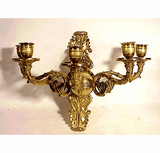 Antique brass wall arm with five branches.