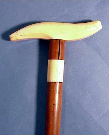 Antique cane with shaped whale ivory handle