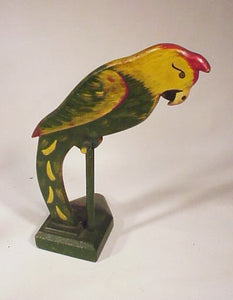 Antique carved and painted wooden parrot doorstop