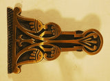 Antique cast brass letter clip in ART DECO design