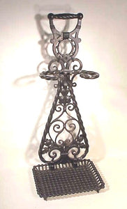 Antique cast-iron fire tool holder