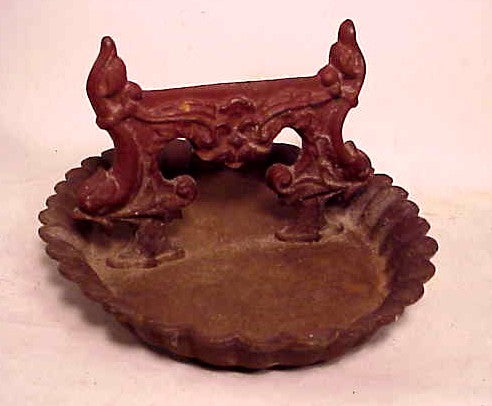 Antique cast iron foot scraper.
