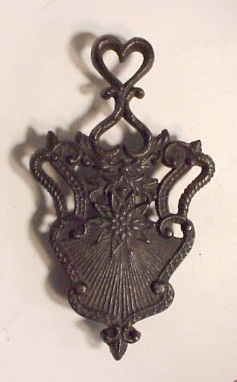 Antique cast iron trivet