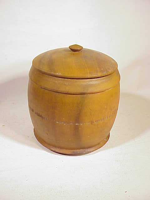 Antique covered wooden jar  circa 1840.