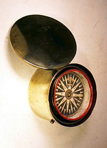 Antique dry-card brass compass circa 1800.