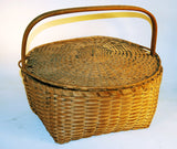 Antique New England covered splint basket
