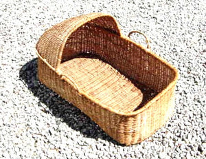 Antique New England splint basket baby's crib.