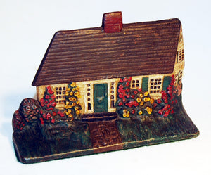 Antique painted cast iron doorstop Cape Cottage