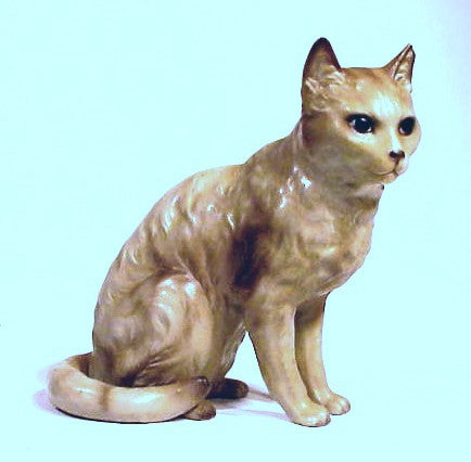 Antique painted metal sitting cat