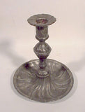 Antique pewter candlestick with saucer base