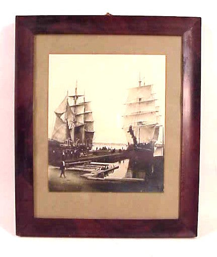 Antique photograph of New Bedford whalers at the wharves.