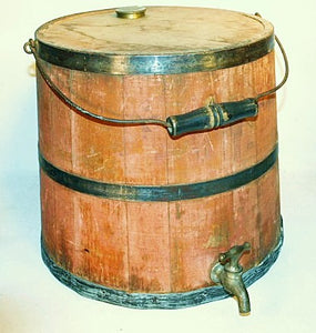 Antique red painted kerosene keg with spigot