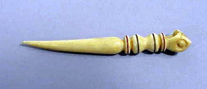 Antique scrimshaw bodkin with clenched fist