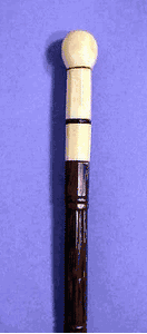 Antique scrimshaw cane with elaborately carved shaft