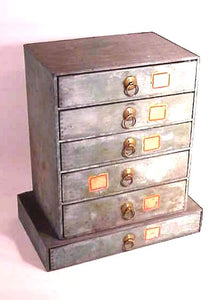 Antique six drawer miniature chest.