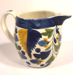 Antique soft paste decorated pitcher