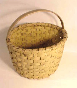 Antique splint basket painted a whalebone color