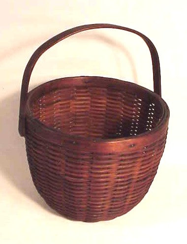 Antique swing-handled apple basket.