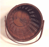 Antique swing-handled apple basket.