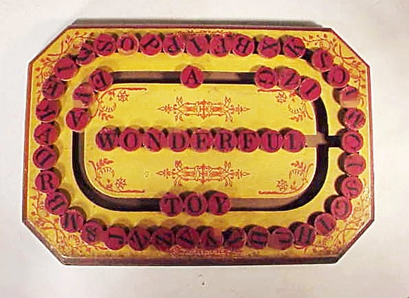 Antique toy spelling game board.