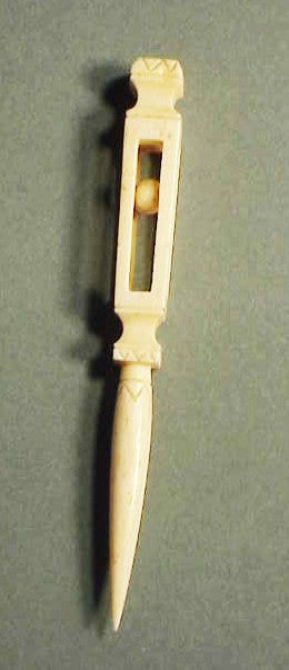 Antique whale ivory scrimshaw bodkin with cage