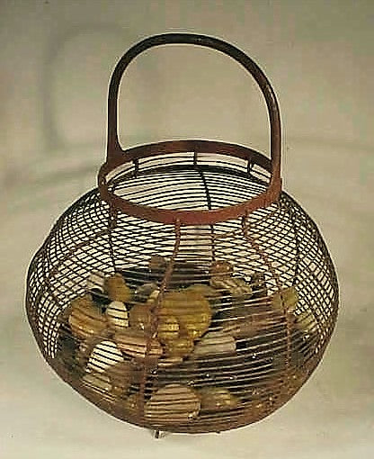 Antique wire and iron basket in original paint.