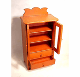 Charming doll size two drawer cupboard in old red paint.