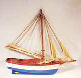 Charming vintage toy sailboat.