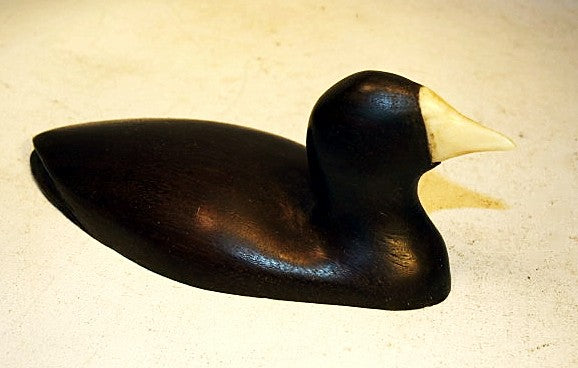 Choice collector's bird carving by  Hooton Kohala '68