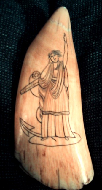 Large antique tooth with figure of HOPE