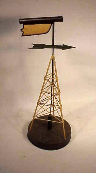 Miniature antique water tower.