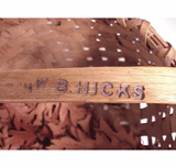 New England splint basket with branded name.