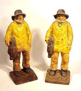 Pair antique cast-iron OLD SALT doorstops.