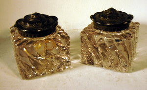 Pair antique glass inkwells with original tops.