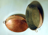 Pair of vintage oval copper pans
