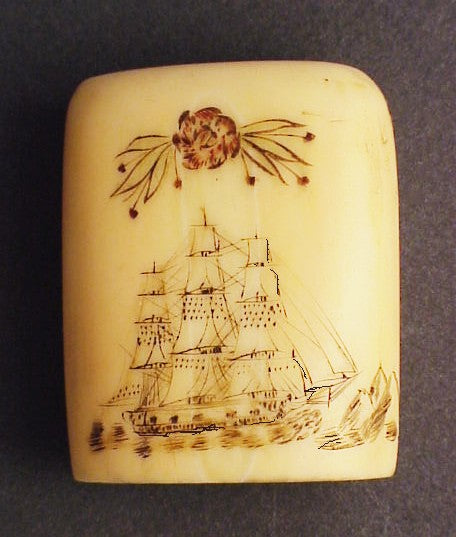 Rare antique scrimshaw seal with engraved details.
